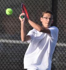 Tyler Klein plays a backhand in his No. 3 singles match Tuesday. (Andy Diffenderfer, Tribune & Georgian)