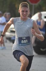 Seth Mulvihill nears the finish line. (Andy Diffenderfer, Tribune & Georgian)