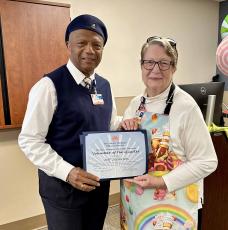 Aaron “Jeff” Jefferson Jr., left, is honored as the Southeast Regional Health System’s Camden Campus Fall Volunteer of the Quarter by Camden Campus Volunteer Services President Kathleen Worthing.