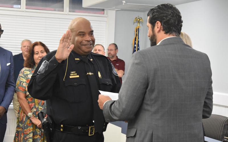 Kingsland Police Chief Rickey Evans is sworn in Monday.